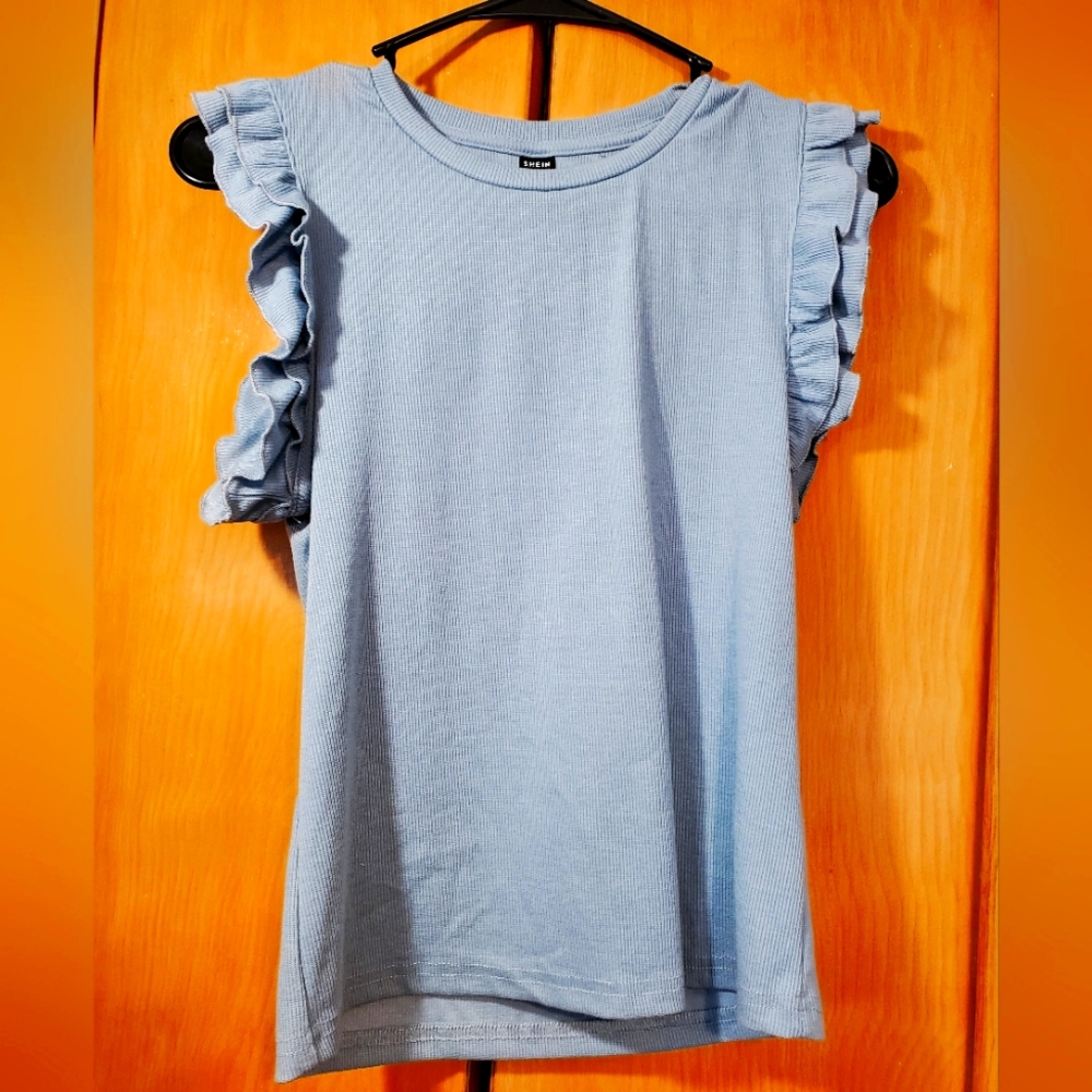 Shein, women's size xs, fashion top. New without tags.